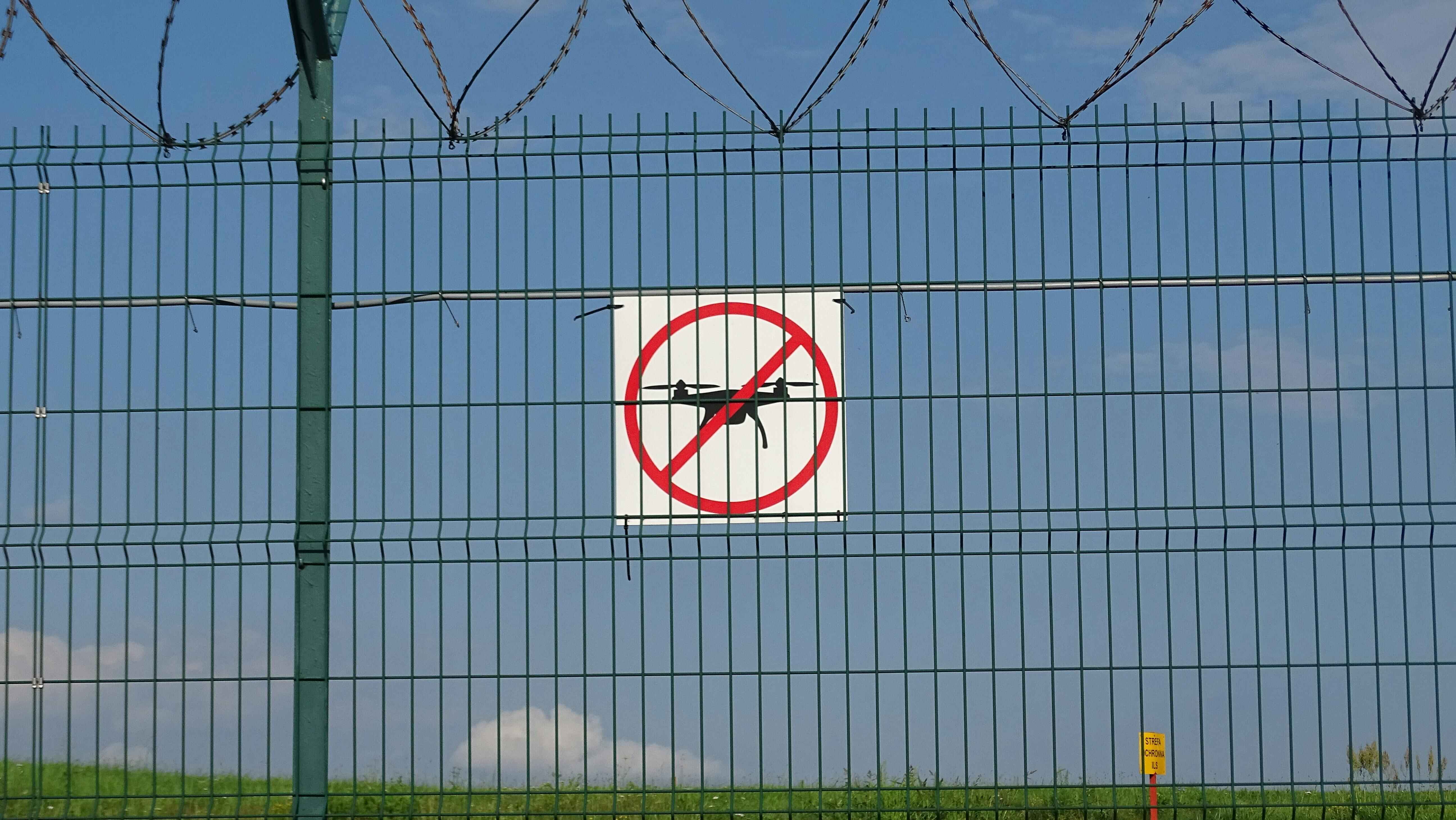 Photo by More on my YouTube: https://www.pexels.com/photo/signage-on-a-metal-fence-4977524/