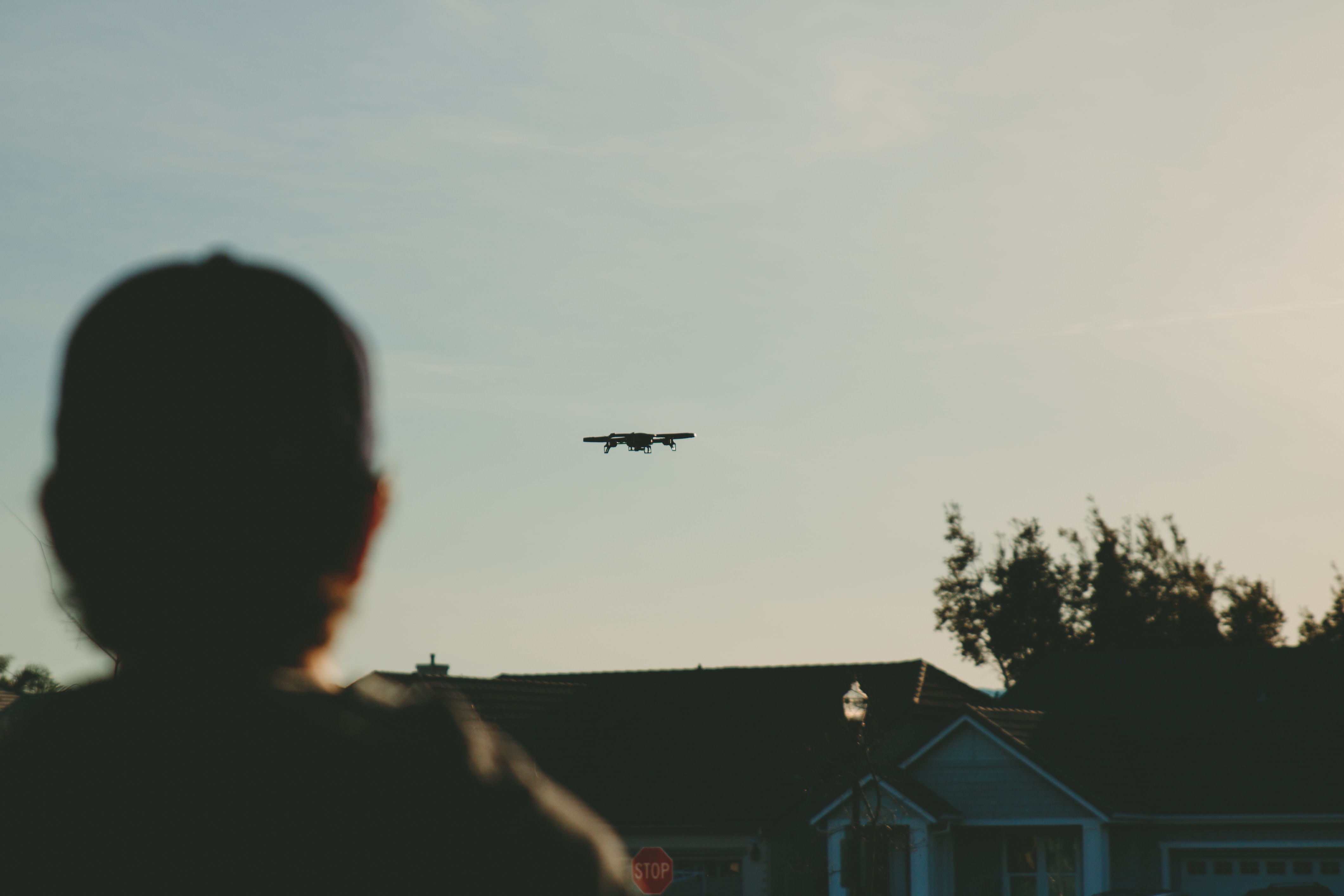 Drone flying over house